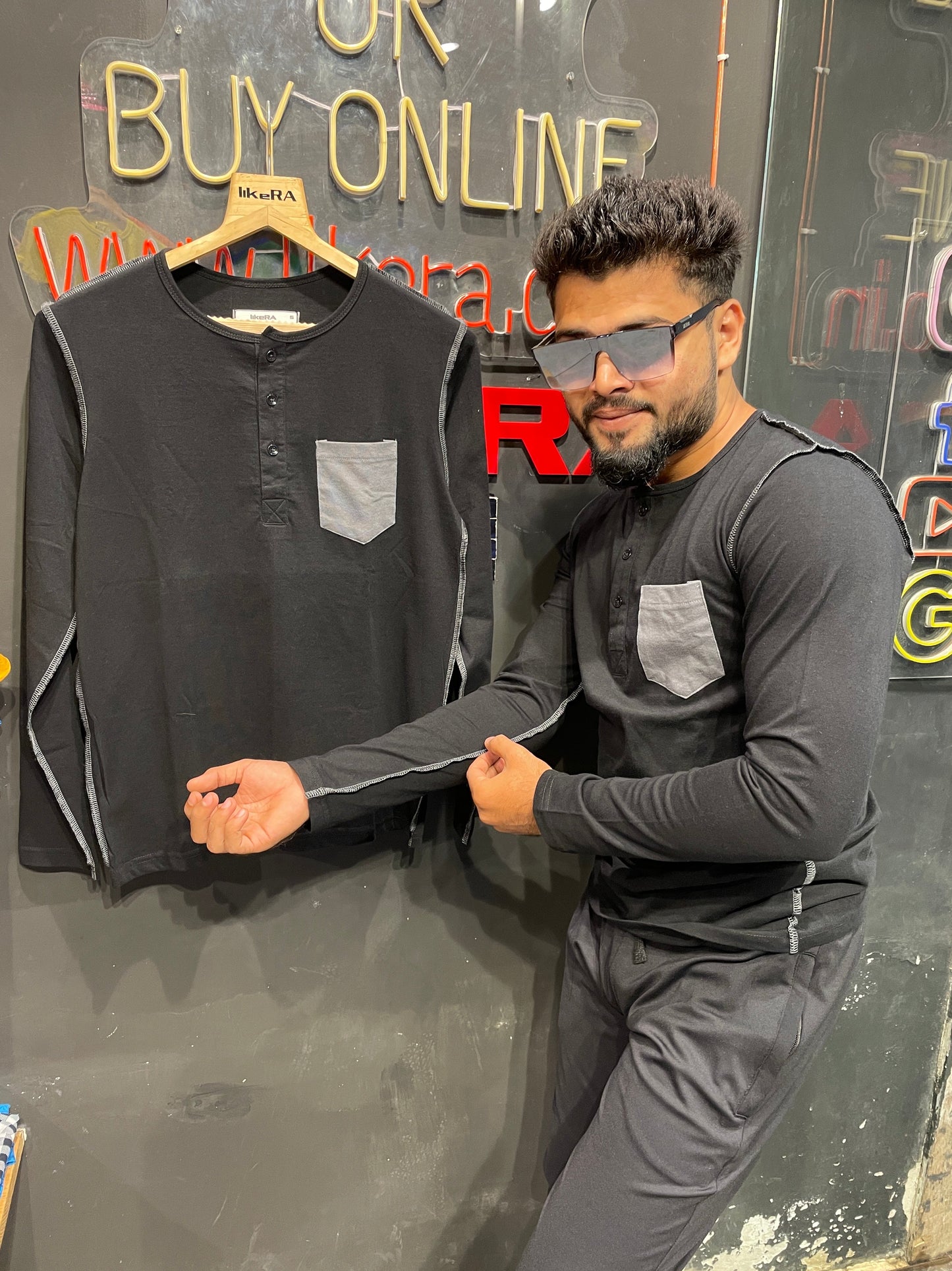 Black Henley With Outside Stitching And Pocket Henley